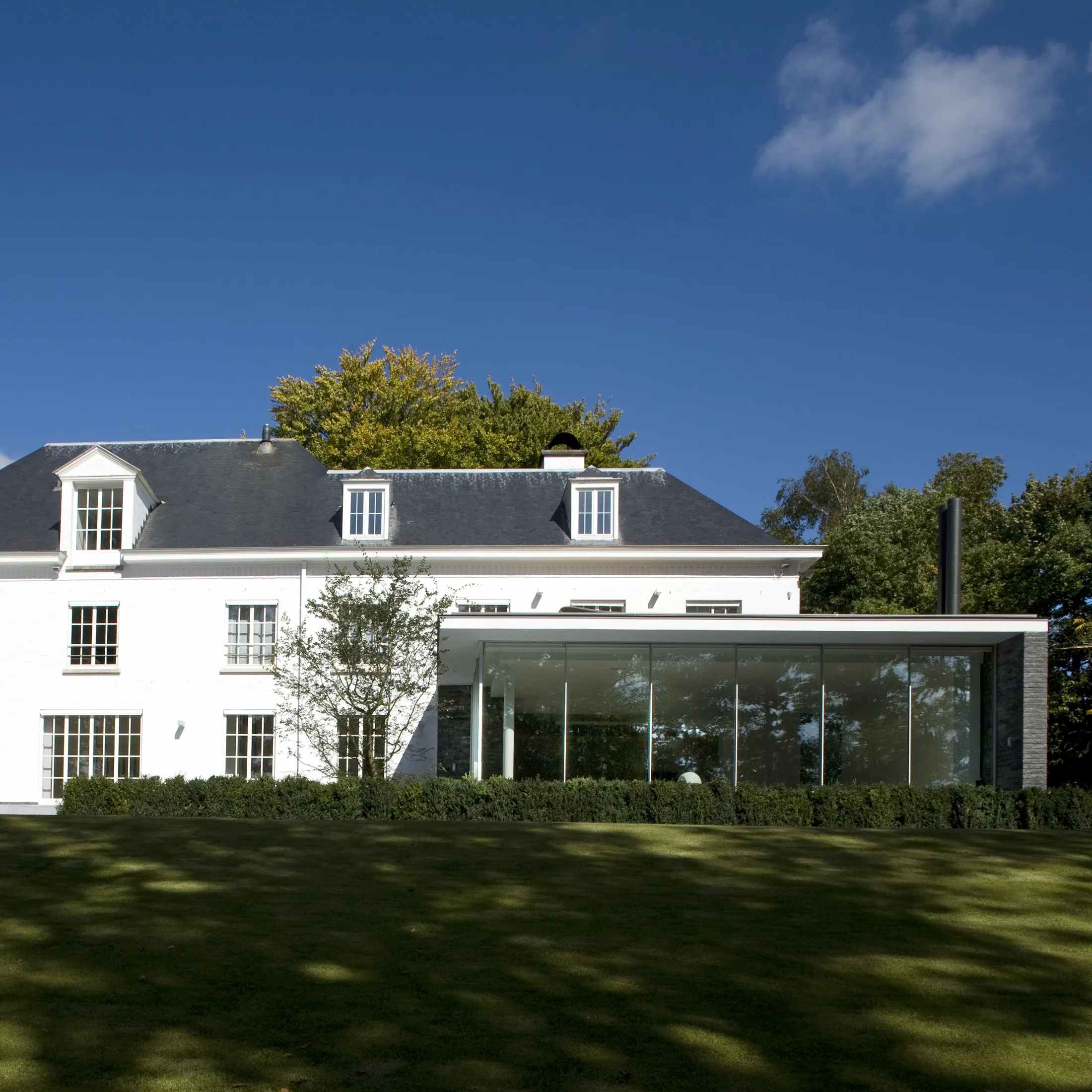 Maison avec extension en verre